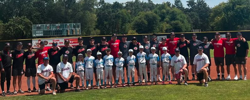 Rivals players lined up on the foul line with a college team